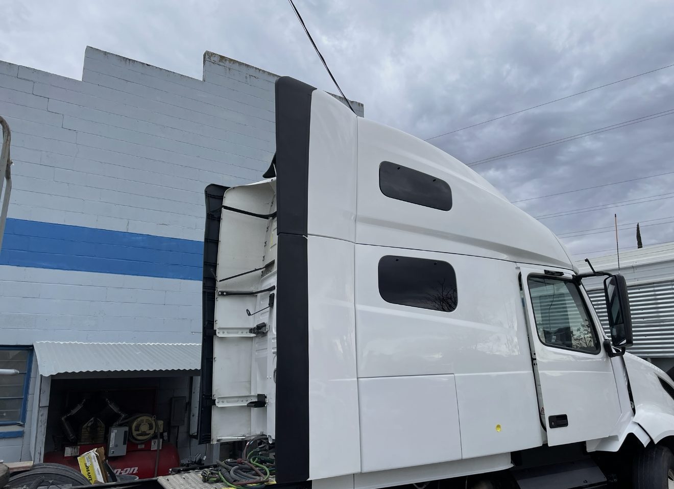 The same cab after a flawless factory-white repaint