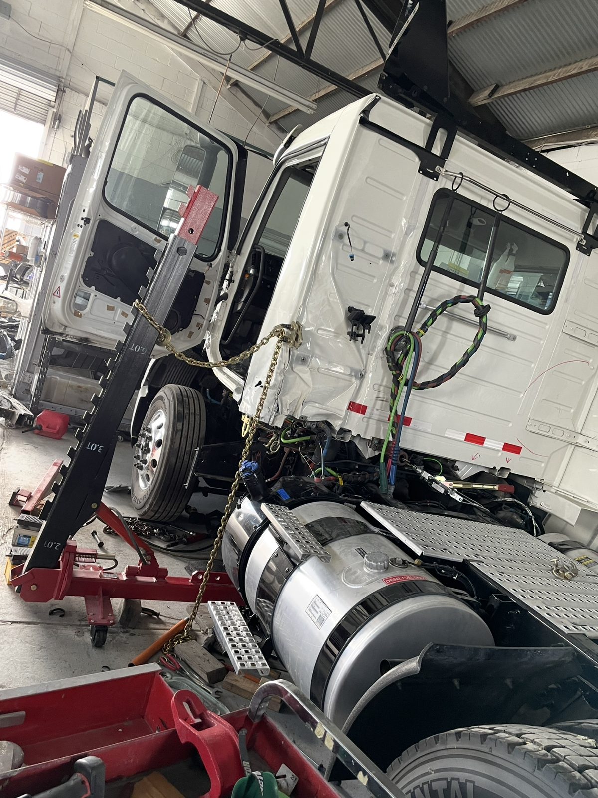 Big-rig cab on frame rack for structural repair